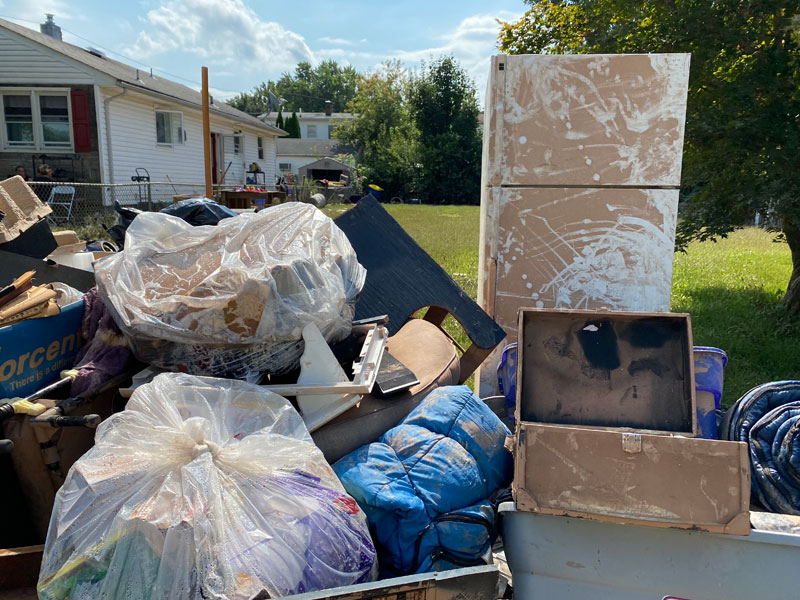 Debris from a flooded basement is shown.