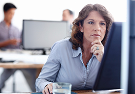 Woman in an office using a computer