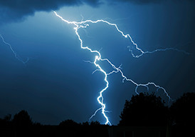 Lightning bolt against a dark sky during a storm