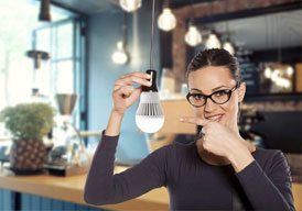 woman pointing to lightbulb