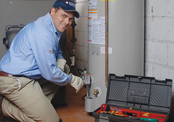 PSE&G technician completing repairs in an enclosed space