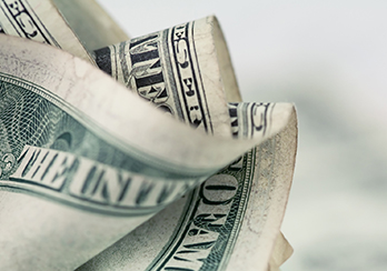 Folded up money bills