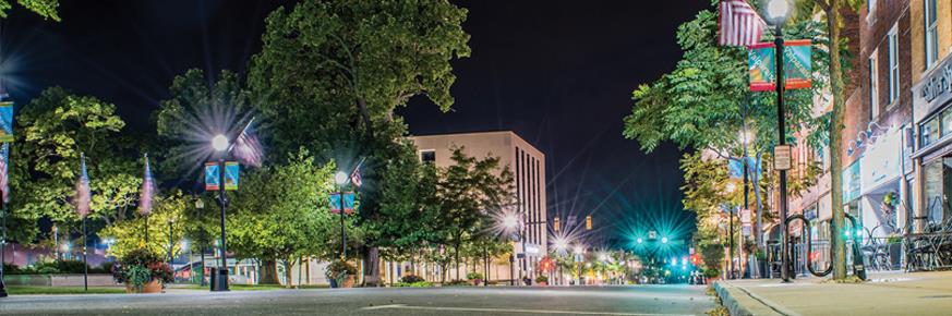 Streetlights shining at night in urban area
