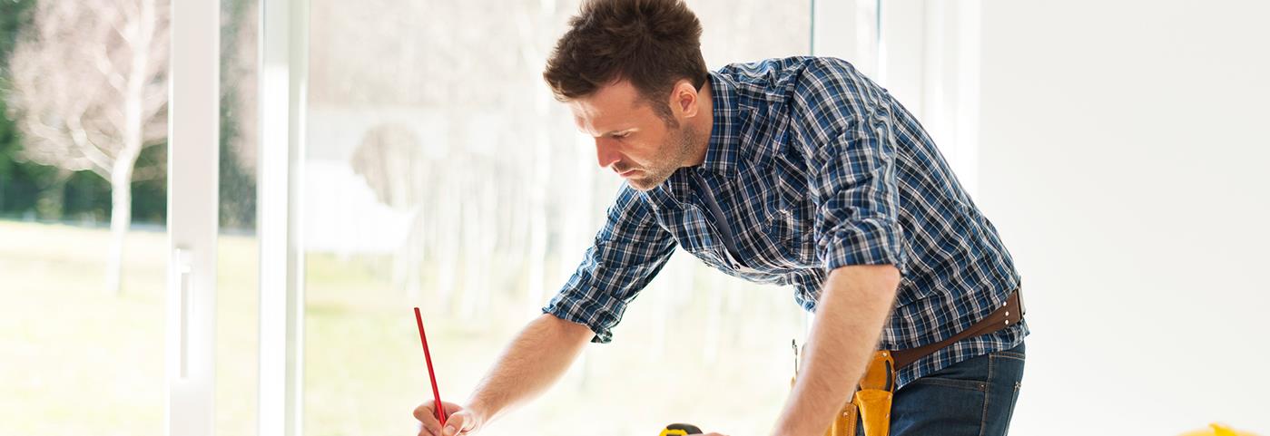 A man looking at plans