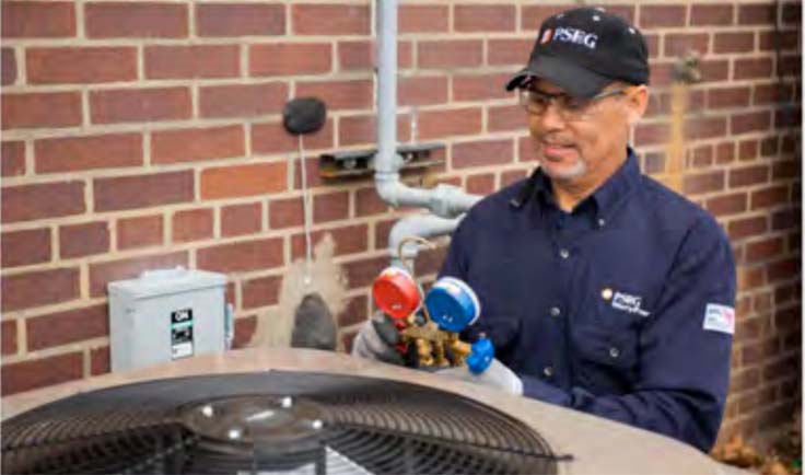 PSE&G technician servicing an HVAC unit