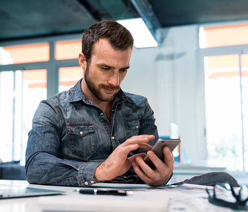 man using a smartphone