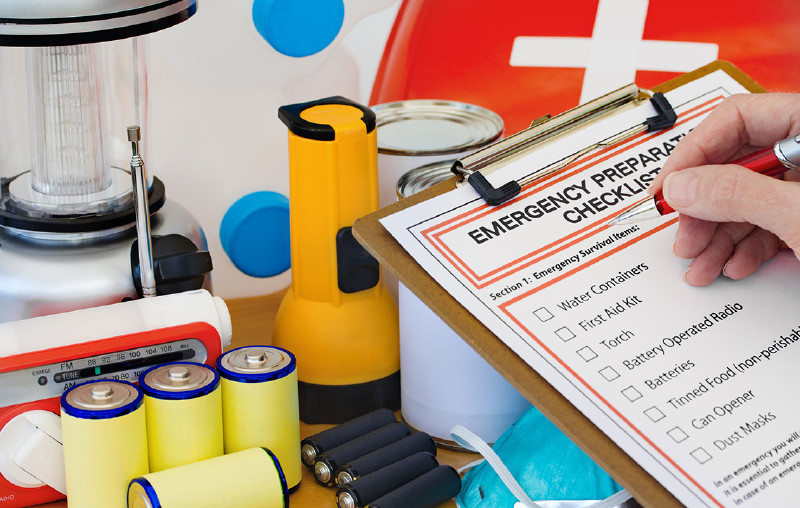 Emergency preparedness checklist, flashlights, and batteries
