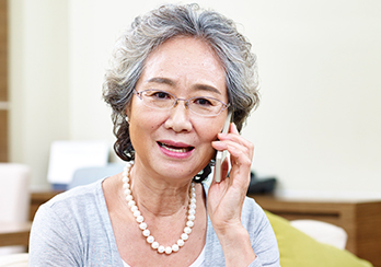 A woman speaking on a smartphone