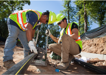 Crew Working With Gas Line