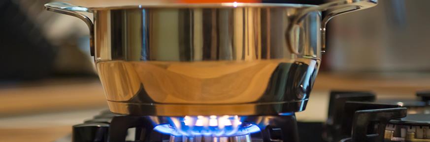 Optional A-Spot (C-ASPOT-2) - Pot sitting on top of a gas stove burner