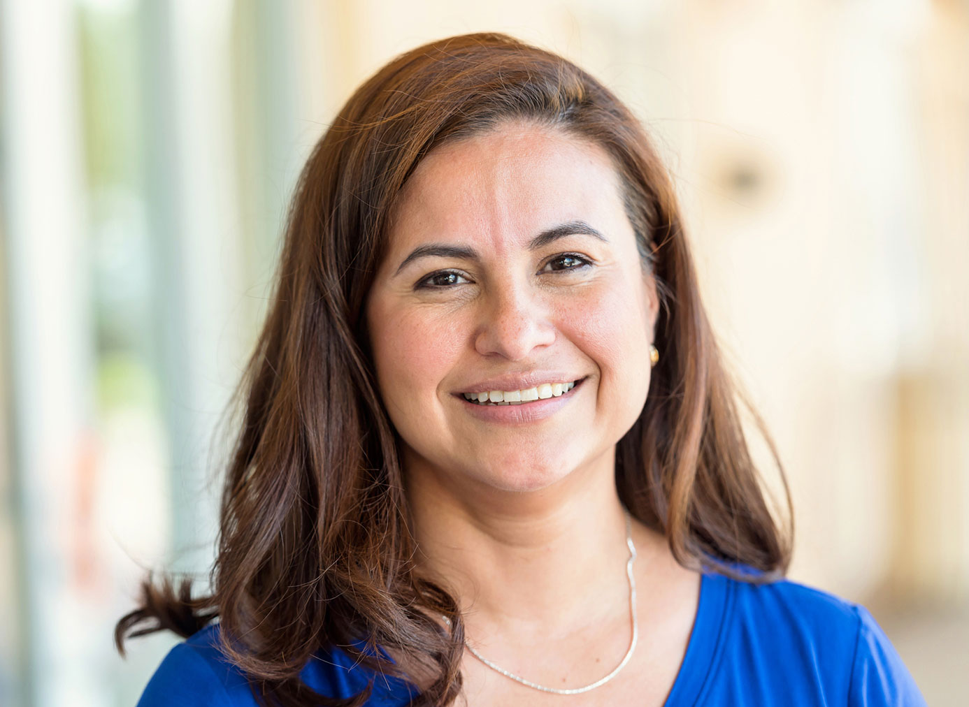 A woman smiling at the camera