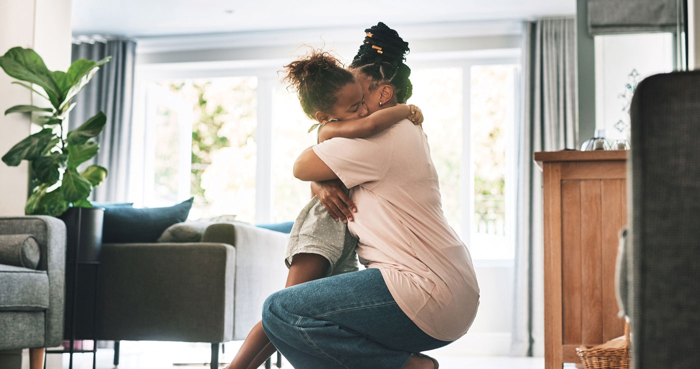 Mother and daughter hugging. Gas safety.
