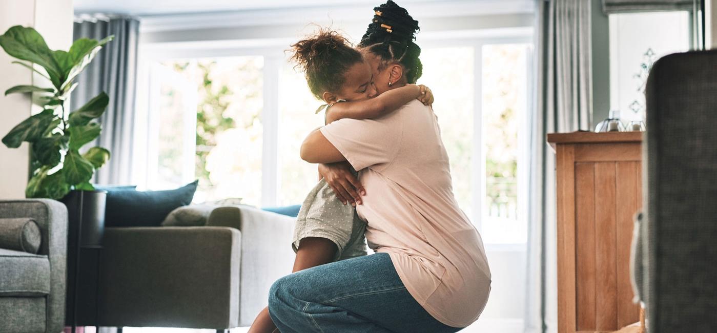 Mother and daughter hugging. Gas safety.